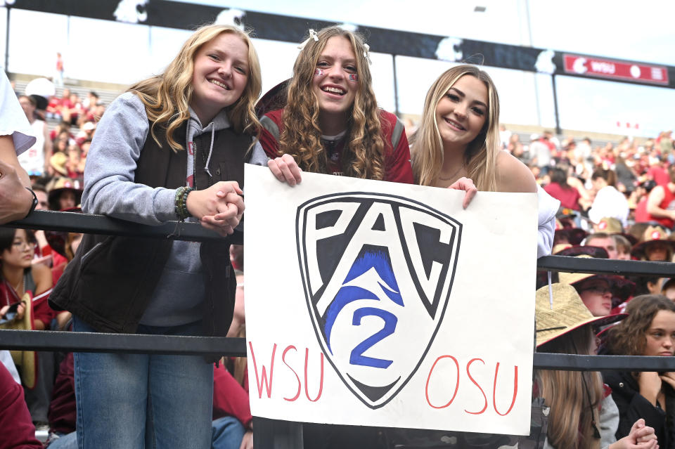Washington State students hold up a Pac-2 sign during a football game between Oregon State Beavers and Washington State. (James Snook-USA TODAY Sports)