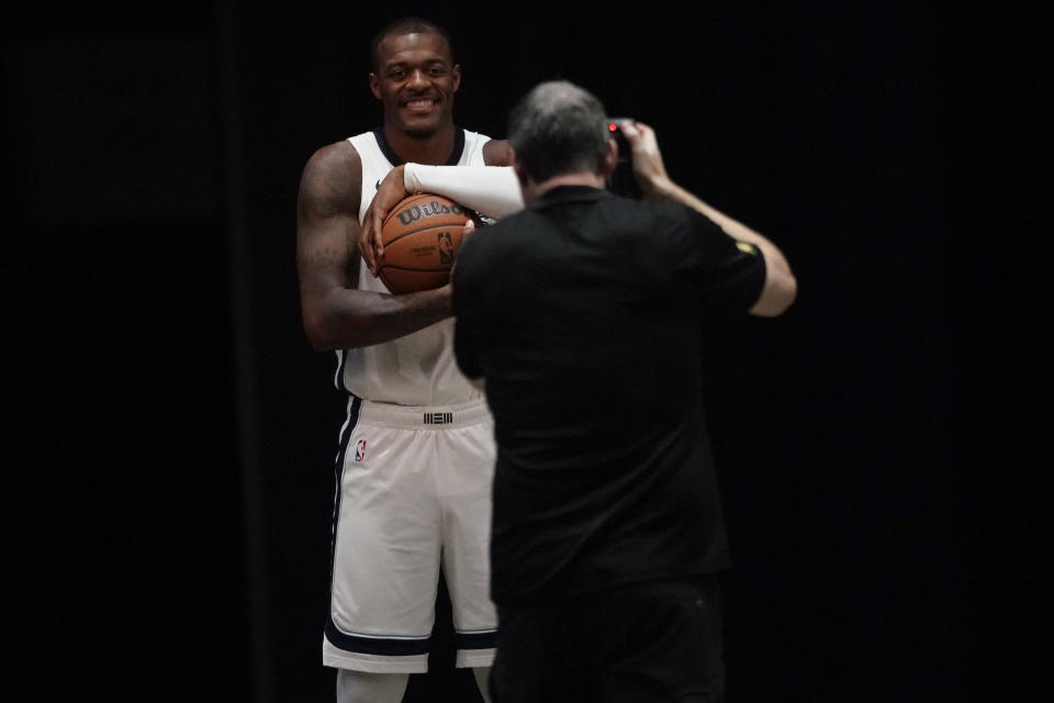 Memphis Grizzlies' Xavier Tillman Sr., left, poses for a portrait during the NBA basketball team's media day in Memphis, Tenn. Monday, Oct. 2, 2023. (AP Photo/George Walker IV)