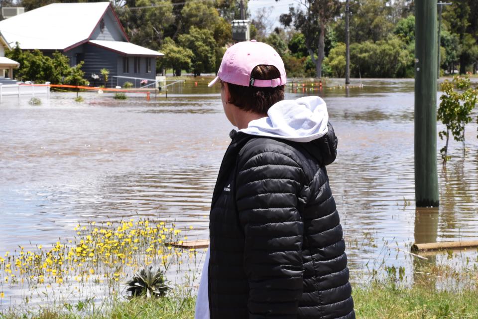 Local Nicole Patten awaits the rising flood waters at her home in Farrand Street, Forbes. Source: AAP