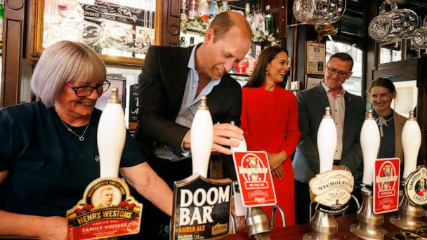 PHOTO: Prince William, Prince of Wales pulls the first pint of Kingmaker a new brew celebrating the coronation as Catherine, Princess of Wales looks on at the Dog and Duck pub in Soho ahead of this weekend's coronation on May 4, 2023 in London. (Jamie Lorriman /Wpa Pool/Getty Images)