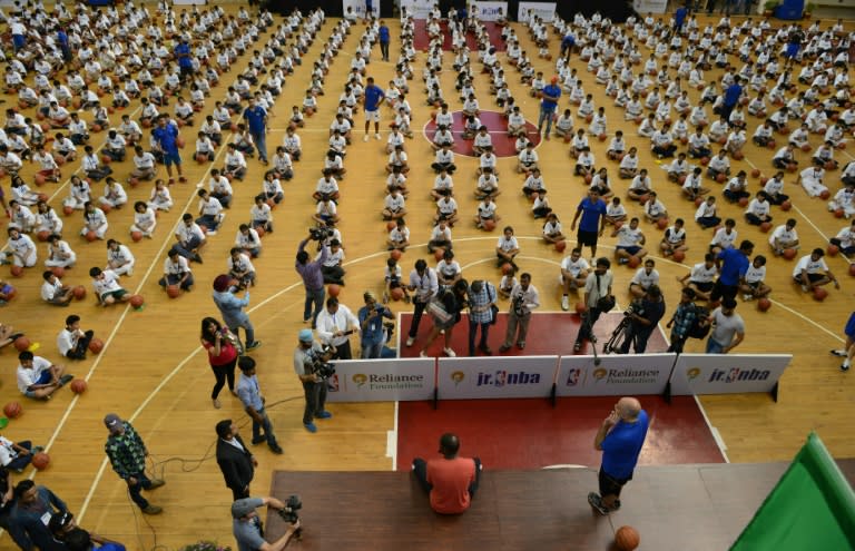 American basketball player for Golden State Warriors Kevin Durant sits on a stage during a NBA academy event in Greater Noida, a suburb of New Delhi on July 28, 2017