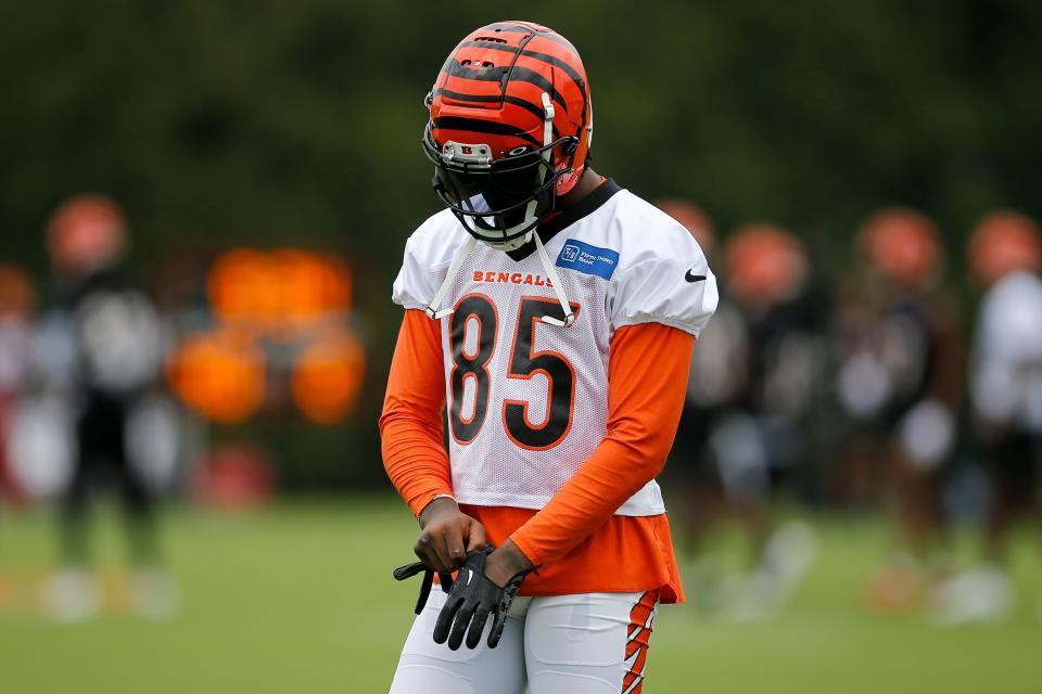 Cincinnati Bengals receiver Tee Higgins (85) gets in position for a drill during the first day of preseason training camp at the Paul Brown Stadium training facility in downtown Cincinnati on Wednesday, July 27, 2022.