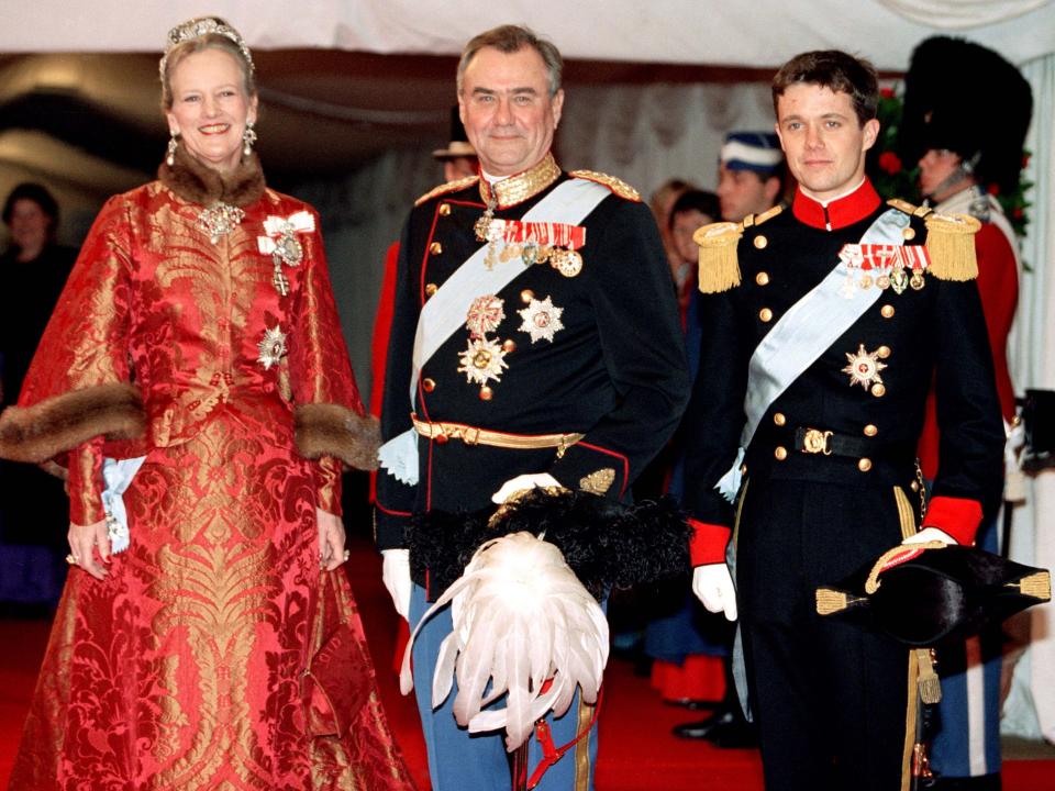 Queen Margrethe, Prince Henrik, and Crown Prince Frederik attend Prince Joachim's first wedding.