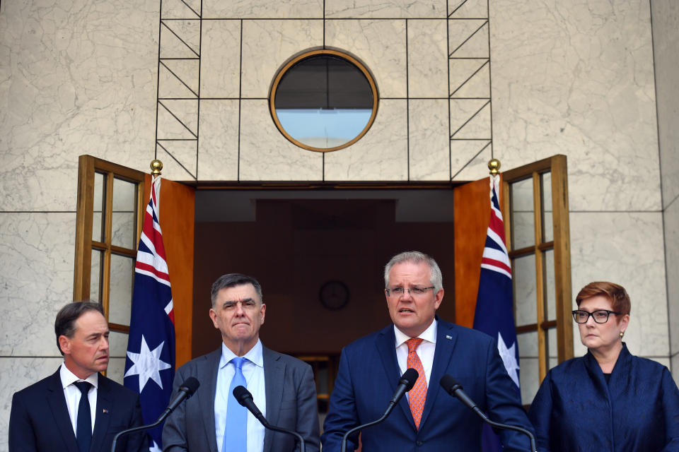 Minister for Health Greg Hunt, Chief Medical Officer Professor Brendan Murphy, Prime Minister Scott Morrison and Minister for Foreign Affairs Marise Payne give a press conference at Parliament House in Canberra. Source: AAP