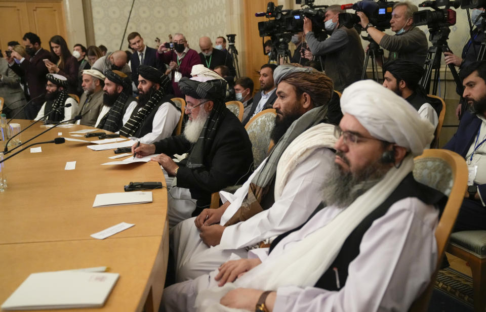 Members of political delegation from the Afghan Taliban's movement attend talks involving Afghan representatives in Moscow, Russia, Wednesday, Oct. 20, 2021. Russia invited the Taliban and other Afghan parties for talks voicing hope they will help encourage discussions and tackle Afghanistan's challenges. (AP Photo/Alexander Zemlianichenko, Pool)