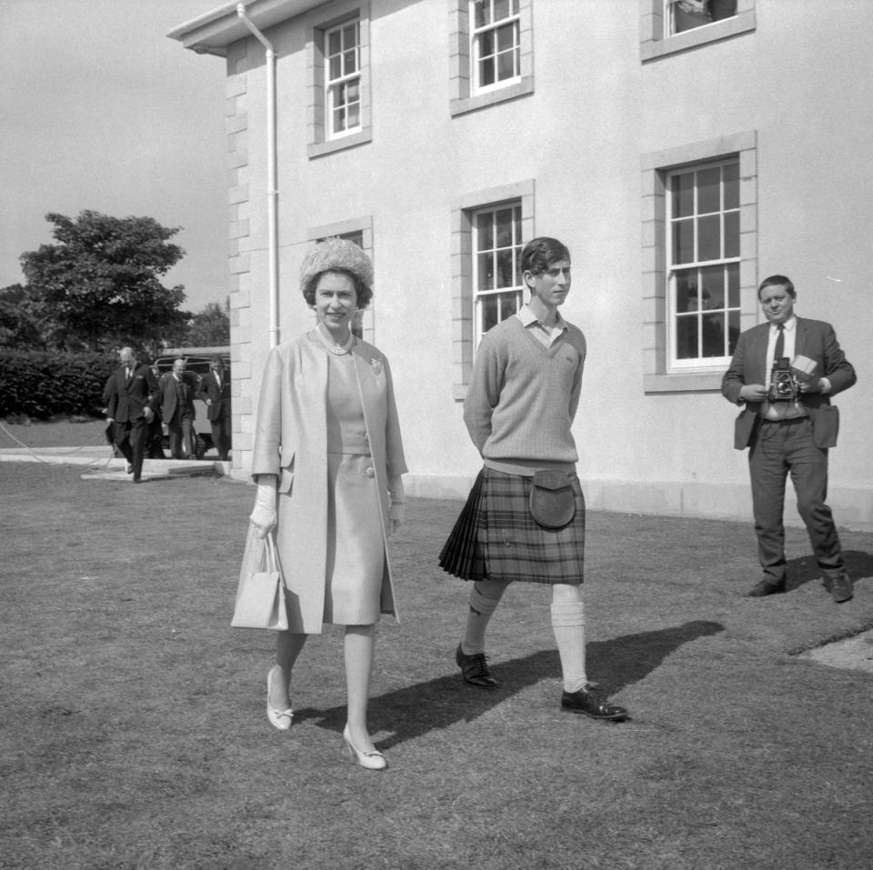 The Queen at Gordonstoun School to open the new sports centre, accompanied by her son the Prince of Wales who was the school’s guardian – head boy (PA) (PA Archive)