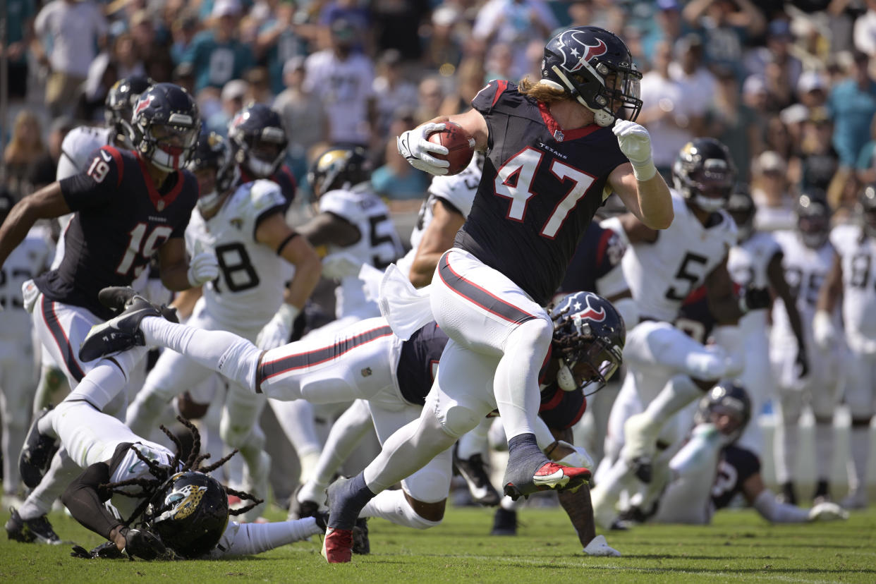 Houston Texans fullback Andrew Beck (47) returns a kickoff for a touchdown against the Jacksonville Jaguars during the second half of an NFL football game, Sunday, Sept. 24, 2023, in Jacksonville, Fla. (AP Photo/Phelan M. Ebenhack)