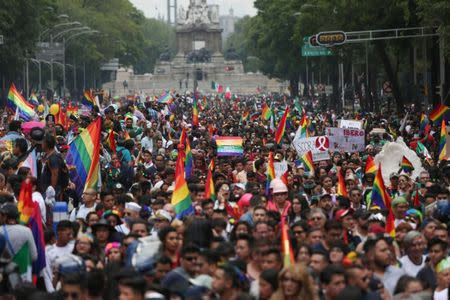 Thousands of people march during a Gay Pride Parade in Mexico City, June 23, 2018. REUTERS/Alexandre Meneghini