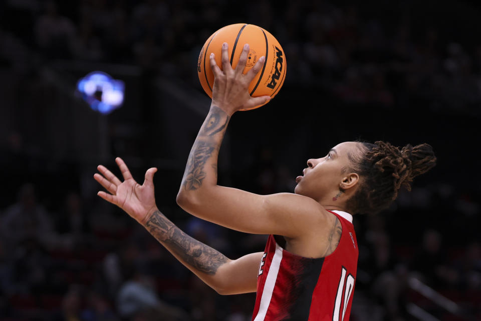 North Carolina State guard Aziaha James shoots during the second half of a Sweet 16 college basketball game against Stanford in the women's NCAA Tournament, Friday, March 29, 2024, in Portland, Ore. (AP Photo/Howard Lao)