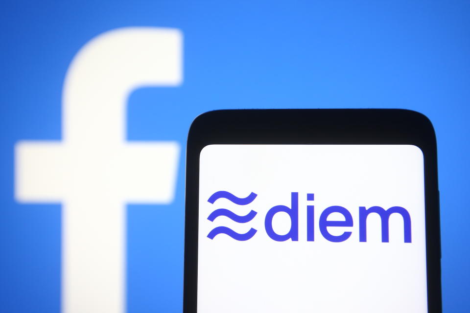 UKRAINE - 2021/04/09: In this photo illustration the Diem, formerly known as Libra, logo is seen is seen on a smartphone screen with a Facebook logo in the background. (Photo Illustration by Pavlo Gonchar/SOPA Images/LightRocket via Getty Images)