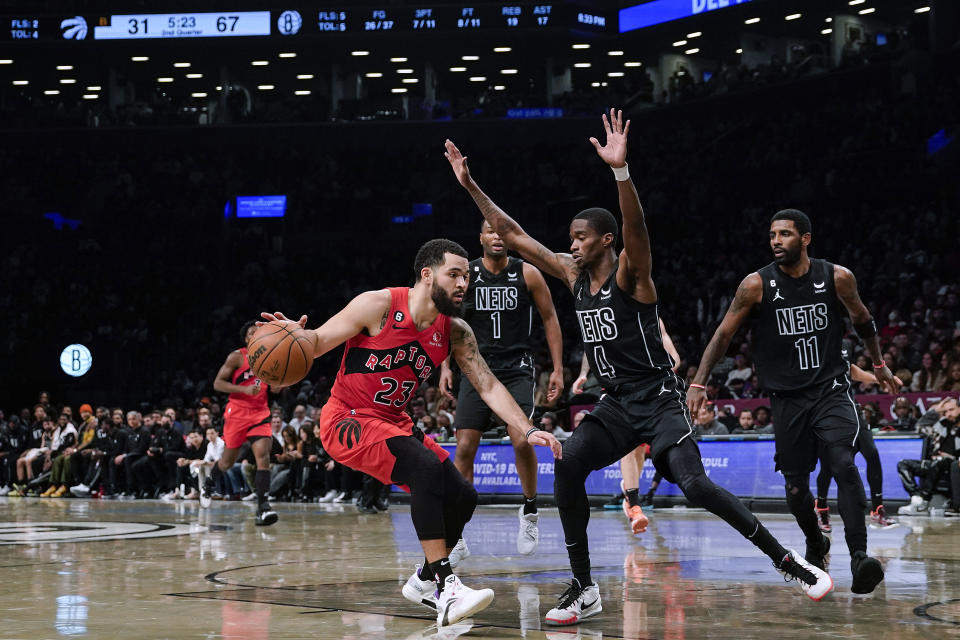 Brooklyn Nets guard Edmond Sumner (4) defends against Toronto Raptors guard Fred VanVleet (23) during the first half of an NBA basketball game Friday, Dec. 2, 2022, in New York. (AP Photo/Eduardo Munoz Alvarez)