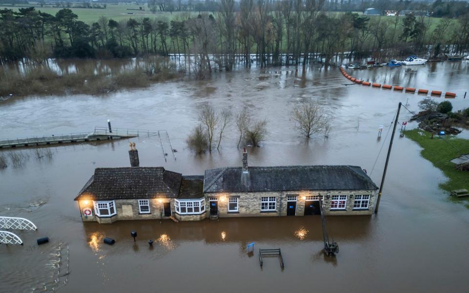 Naburn Lock is shown submerged in flood water on the outskirts of York