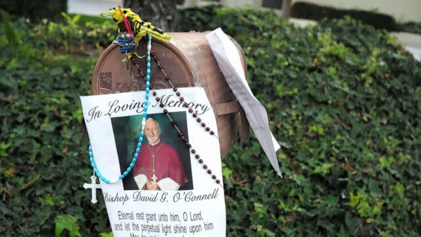 PHOTO: A picture with a prayer hangs on the mailbox as a makeshift memorial grows for Bishop David O'Connell, Feb. 21, 2023, in front of his home in Hacienda Heights, Calif. (Keith Birmingham/The Orange County Register via AP)