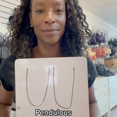 Screenshot from a video by @nicolacrookonline showing a drawing on pendulous breasts