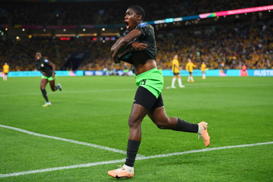 BRISBANE, AUSTRALIA - JULY 27: Asisat Oshoala of Nigeria celebrates after scoring her team's third goal during the FIFA Women's World Cup Australia & New Zealand 2023 Group B match between Australia and Nigeria at Brisbane Stadium on July 27, 2023 in Brisbane, Australia. (Photo by Justin Setterfield/Getty Images)