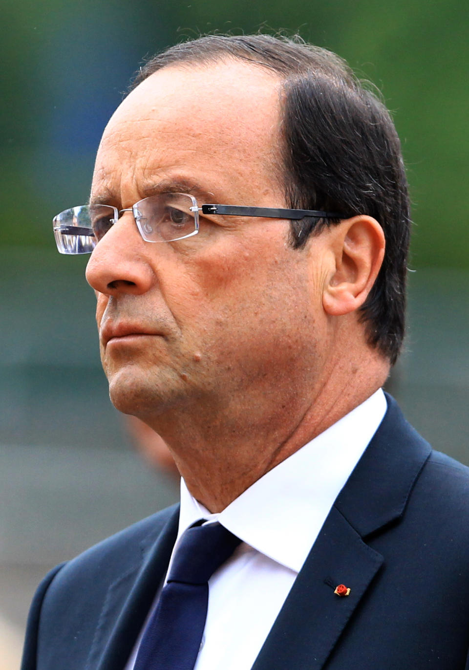 French President Francois Hollande attends a ceremony to mark the 72nd anniversary of Gen. Charles de Gaulle's appeal of June 18, 1940, at the Mont Valerien memorial in Suresnes, outside of Paris, Monday, June 18, 2012. The appeal, which was delivered on the BBC by Charles de Gaulle, served to rally his countrymen after the fall of France to Nazi Germany. (AP Photo/Bob Edme, Pool)