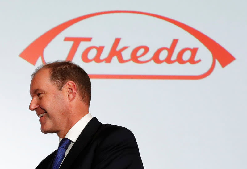 FILE PHOTO: Takeda Pharmaceutical Co. President and Chief Executive Officer Christophe Weber leaves a news conference in Tokyo, Japan May 9, 2018. REUTERS/Kim Kyung-Hoon