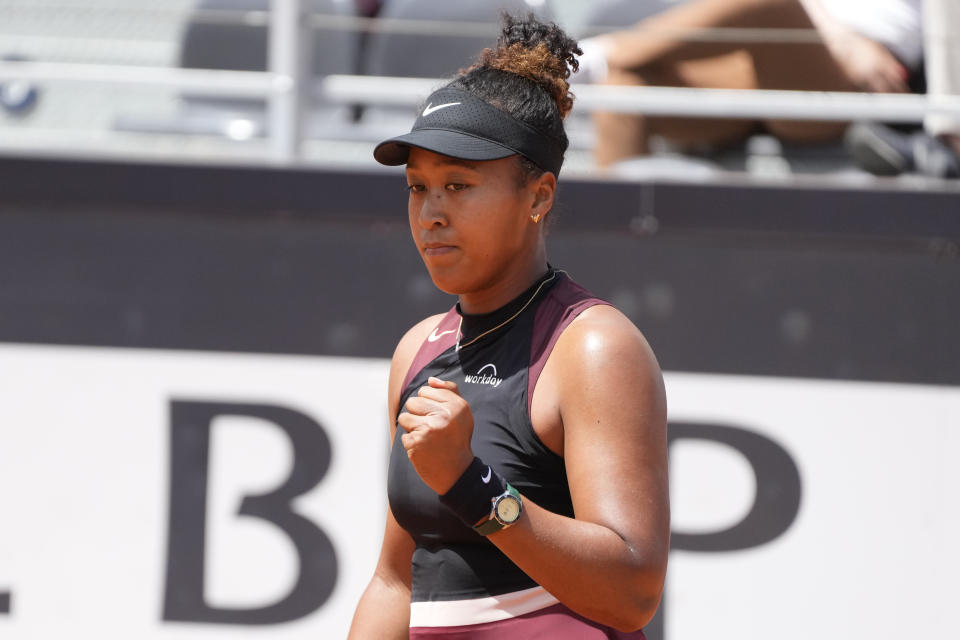 Naomi Osaka, of Japan, celebrates after winning a point during her match against Daria Kasatkina, of Russia, at the Italian Open tennis tournament in Rome, Saturday, May 11, 2024.(AP Photo/Gregorio Borgia)
