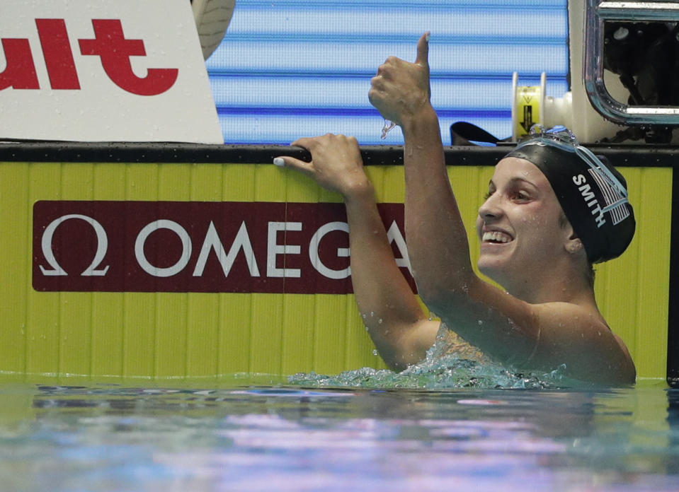 File-This July 26, 2019, file photo shows United States' Regan Smith reacting after her women's 200m backstroke semi final at the World Swimming Championships in Gwangju, South Korea. The teenager from Minnesota broke the world record in the 200 back at the world championships in South Korea in July. Smith turns 18 on Feb. 9. (AP Photo/Mark Schiefelbein, File)