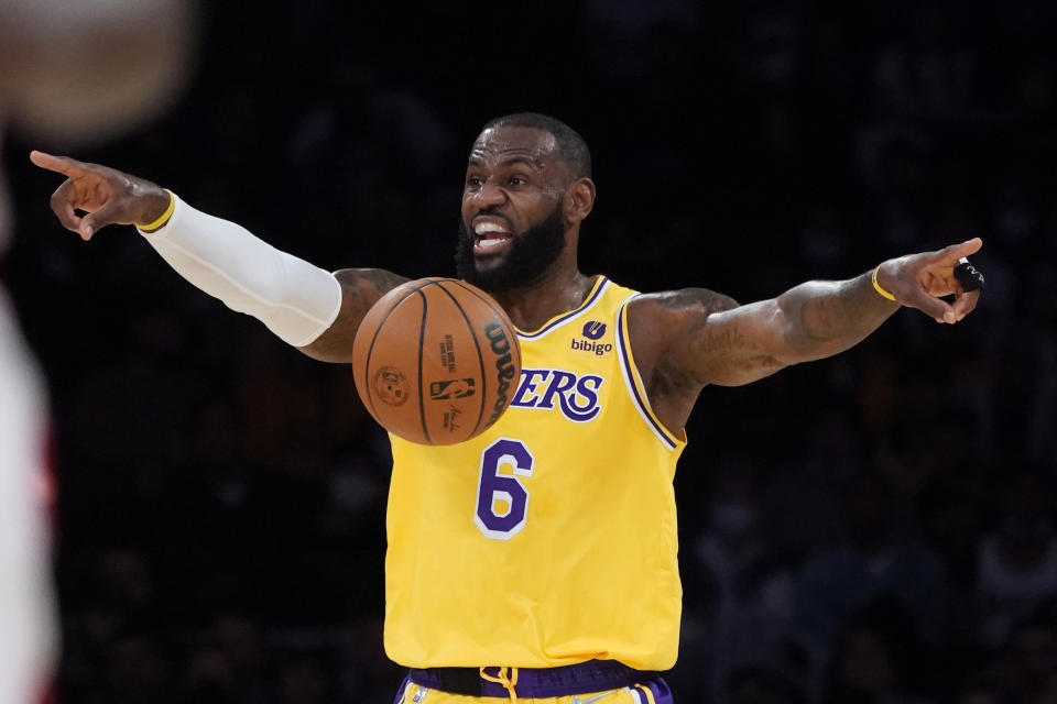 Los Angeles Lakers forward LeBron James (6) directs the offense during the first half of an NBA basketball game against the Houston Rockets Tuesday, Nov. 2, 2021, in Los Angeles. (AP Photo/Marcio Jose Sanchez)
