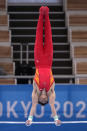 China's Sun Wei performs on the horizontal bar during the men's artistic gymnastic qualifications at the 2020 Summer Olympics, Saturday, July 24, 2021, in Tokyo. (AP Photo/Ashley Landis)