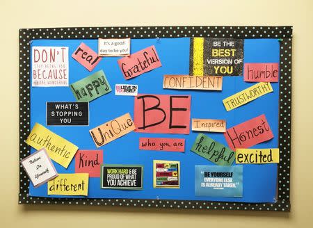 Dr. Nicole Arthur’s “Be” board hangs in the hall outside of her office to inspire patients and staff in Bay Minette, Alabama, U.S. on June 22, 2017. REUTERS/Jilian Mincer