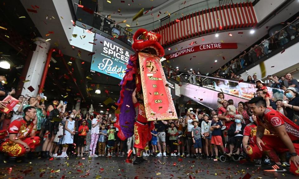 Jin Wu Koon dance troupe performs a roving lion dance at Paddy’s Markets during Lunar New Year celebrations, 21 January, 2023.