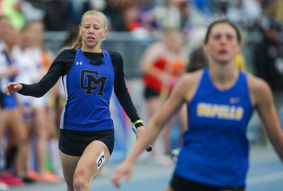 Collins Maxwell's Alexis Houge competes in the Class 1A 4x100-meter relay during the 2022 Iowa high school track and field state championships at Drake Stadium Saturday, May 21, 2022 in Des Moines.