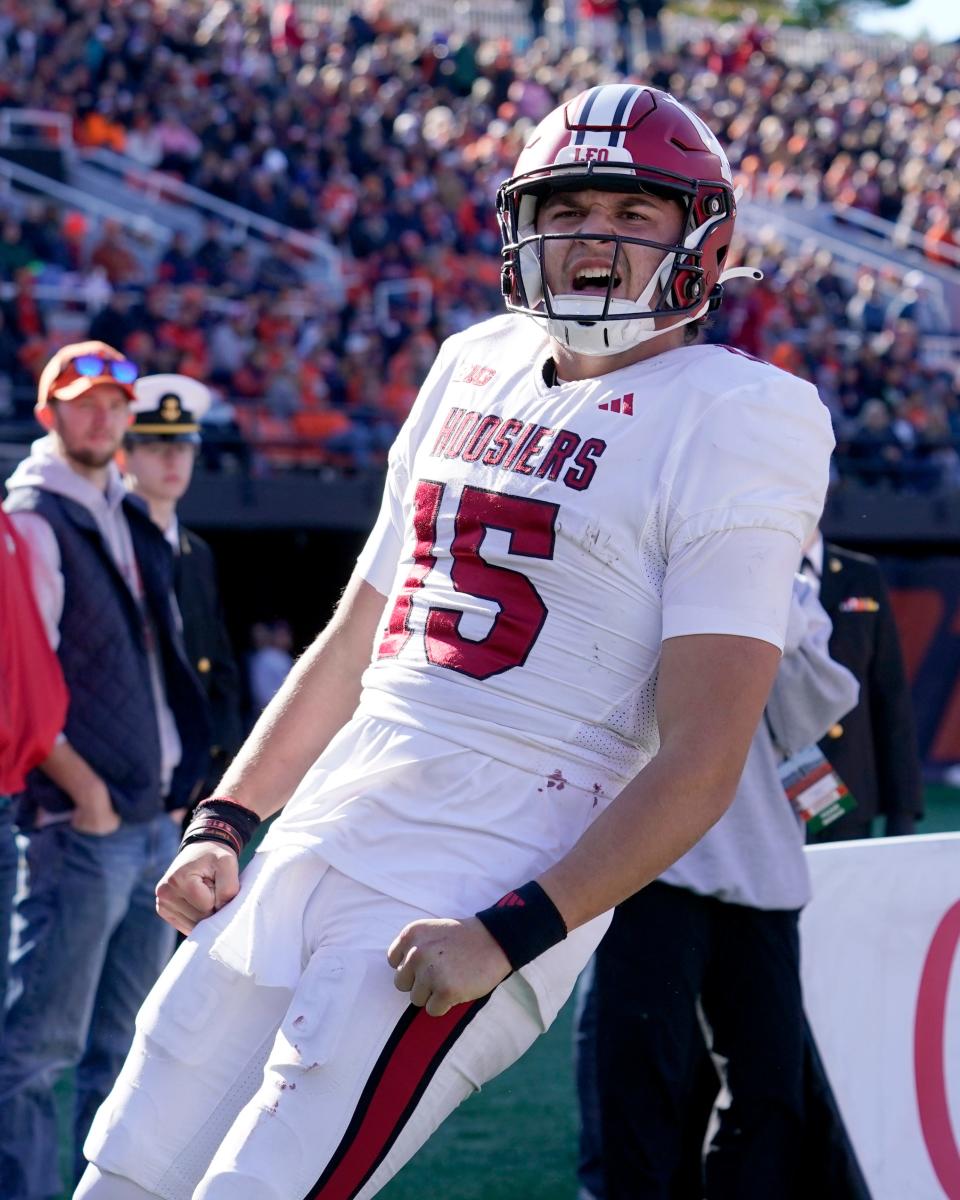 Indiana quarterback Brendan Sorsby celebrates his touchdown during the first half of an NCAA college football game against Illinois Saturday, Nov. 11, 2023, in Champaign, Ill. (AP Photo/Charles Rex Arbogast)