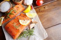 <p>Fatty fish like salmon and mackerel are high in omega-3 fatty acids, which reduce inflammation and can help lower blood pressure. They are also a great source of <a href="https://www.prevention.com/food-nutrition/a20437976/foods-high-in-vitamin-d/" rel="nofollow noopener" target="_blank" data-ylk="slk:vitamin D;elm:context_link;itc:0;sec:content-canvas" class="link ">vitamin D</a>, which helps the body absorb calcium, protect against <a href="https://www.prevention.com/life/a20465433/surprising-depression-symptoms/" rel="nofollow noopener" target="_blank" data-ylk="slk:depression;elm:context_link;itc:0;sec:content-canvas" class="link ">depression</a>, and regulate blood pressure.</p><p><strong>Try it:</strong> Cooking fatty fish is super easy. Simply season it with salt, pepper, and herbs, add a little olive oil, and pop it in the oven to broil. For a specific recipe, we love this <a href="https://www.prevention.com/food-nutrition/recipes/a23087868/honey-spiced-salmon-recipe/" rel="nofollow noopener" target="_blank" data-ylk="slk:honey-spiced salmon with quinoa;elm:context_link;itc:0;sec:content-canvas" class="link ">honey-spiced salmon with quinoa</a>.</p>