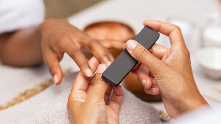 The most common nail cancers that dermatologists see are melanomas, which usually present as a black or dark brown streak down the nail. (Photo: AdobeStock.com)