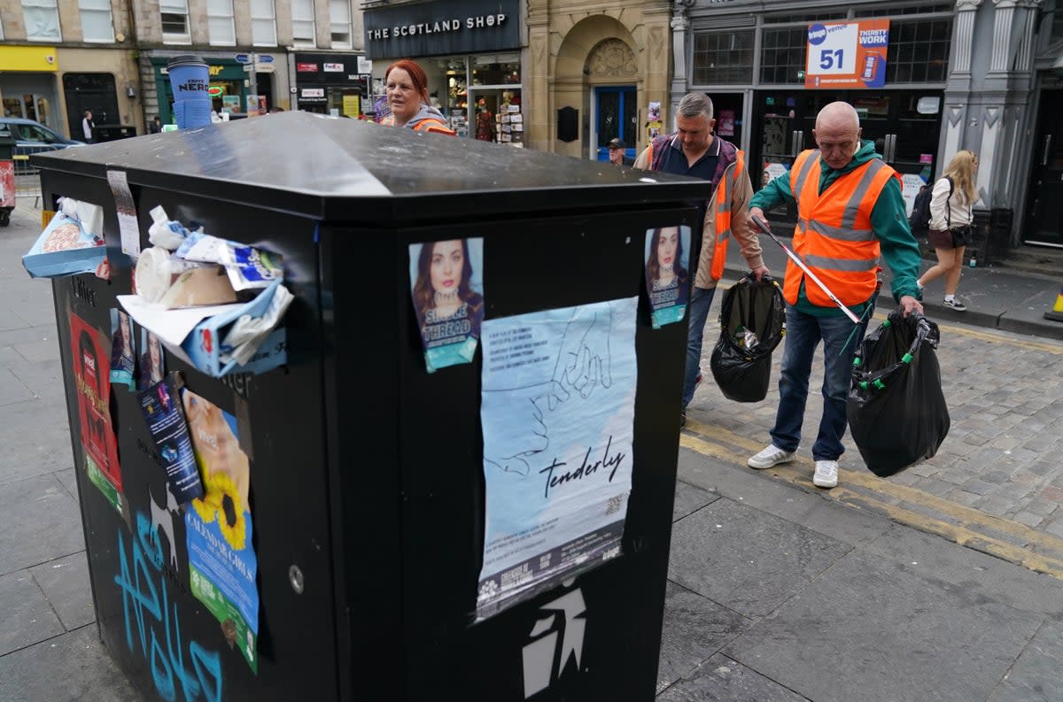 Rubbish bins in Edinburgh have not been emptied as the result of a strike by cleaning workers (Andrew Milligan/PA) (PA Wire)