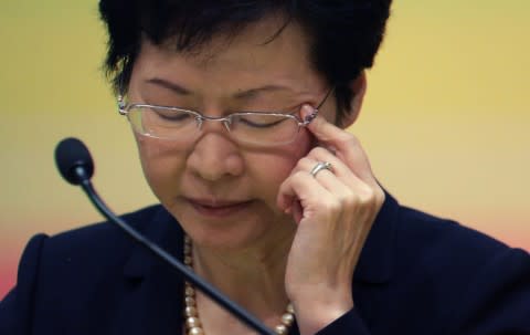 Chief Secretary Carrie Lam Cheng Yuet-ngor, attend the press conference on the report on the consultation of electing the future Hong Kong leader at a news conference at the Hong Kong government headquarters. Hong Kong's leader formally proposed electoral reforms to Beijing on Tuesday, although he stopped short of recommending specific changes ahead of an election in the Asian financial centre in 2017 for its next chief executive. 15JUL14