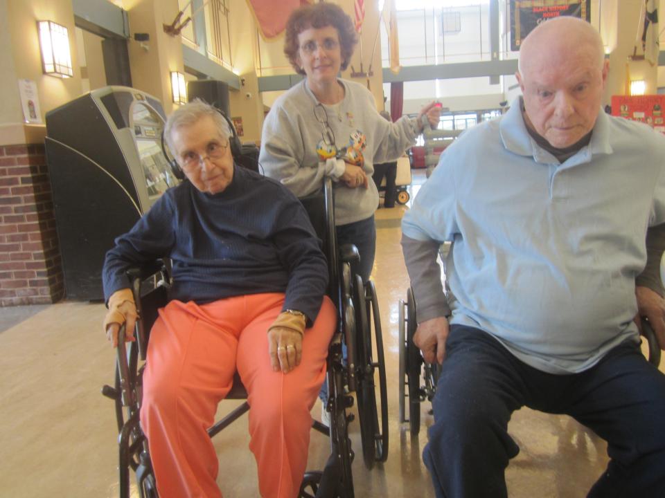 Regina Discenza poses with her parents Madeline and Charles Costantino.