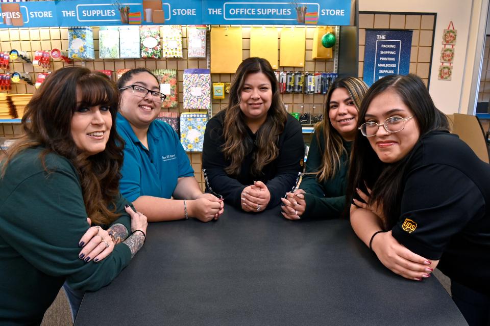 The staff of The UPS Store in AbileneÕs River Oaks Shopping Center Dec. 28. Pictured is Tracey LeMaster (left), Julie Guevara, store manager Lisa Jackson, Andreana Polk and Evonne Delapaz.