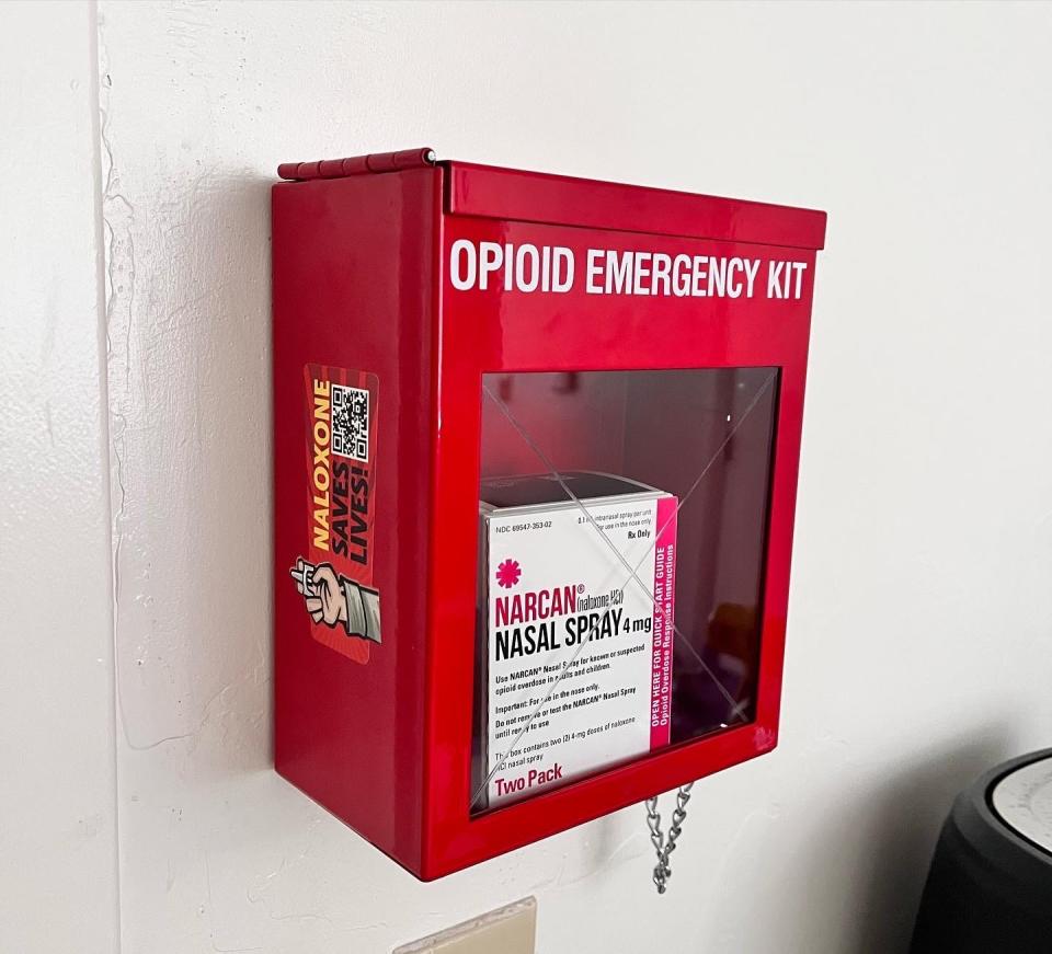 An opioid emergency kit containing Narcan nasal spray installed on the wall of a fraternity house on the University of Arizona campus in Tucson.