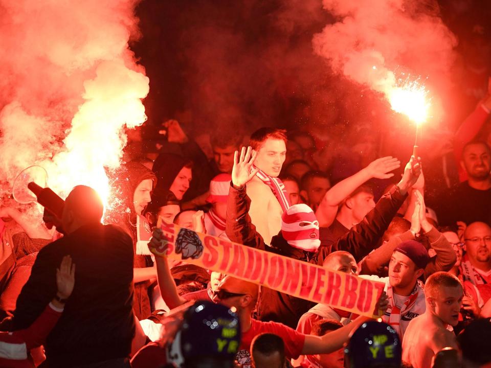 Cologne fans during their side's clash with Arsenal at the Emirates: Getty