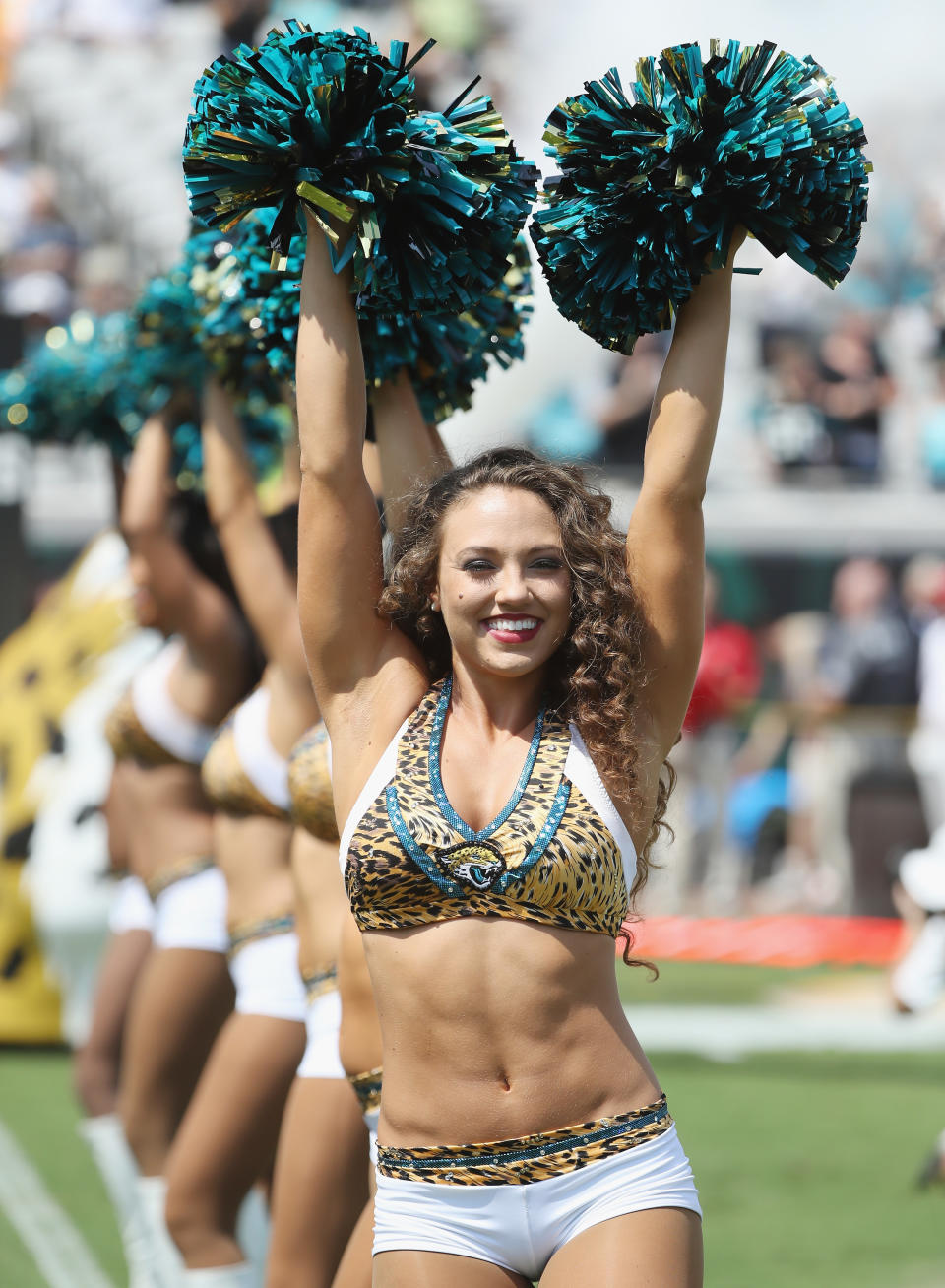 <p>Jacksonville Jaguars cheerleaders perform on the field prior to the start of their game against the Tennessee Titans at EverBank Field on September 17, 2017 in Jacksonville, Florida. (Photo by Sam Greenwood/Getty Images) </p>