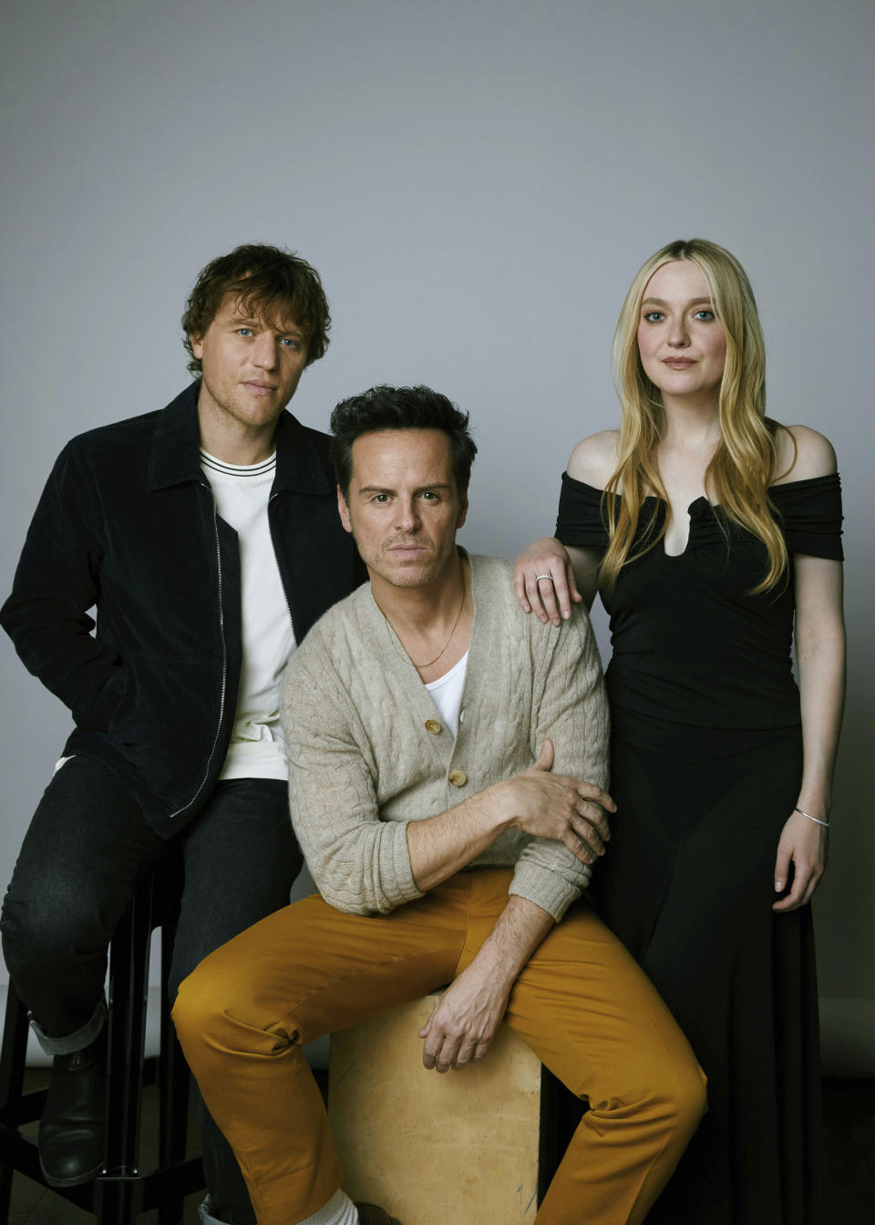 Johnny Flynn, from left, Andrew Scott, and Dakota Fanning pose for a portrait to promote the television miniseries "Ripley" on Tuesday, March 26, 2024, in New York. (Photo by Taylor Jewell/Invision/AP)