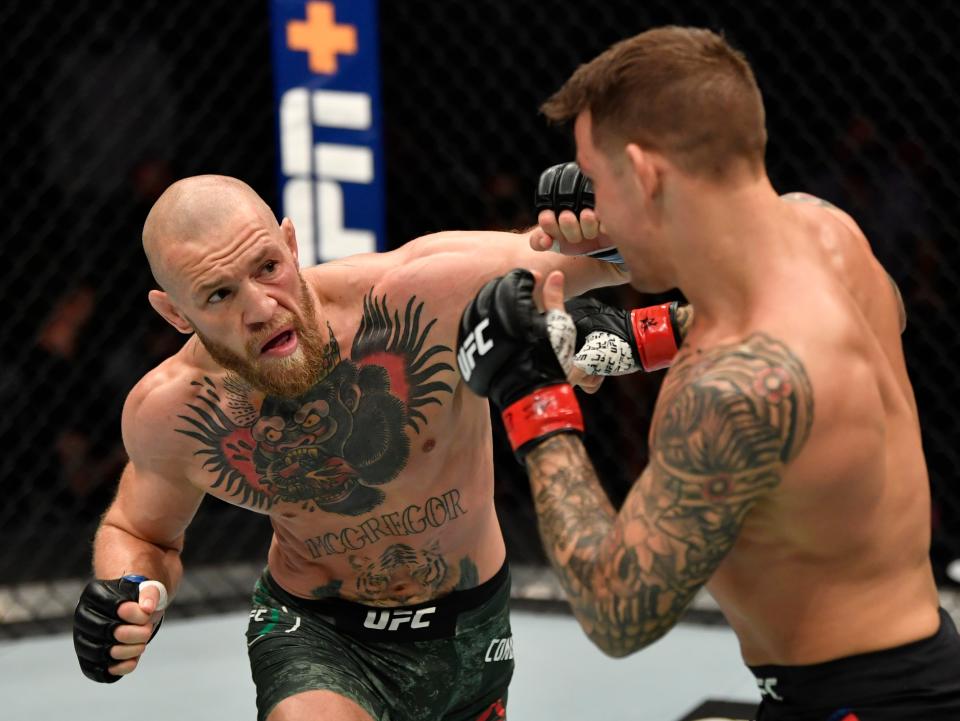 Conor McGregor (left) and Dustin Poirier in their second fight, in January (Zuffa LLC via Getty Images)