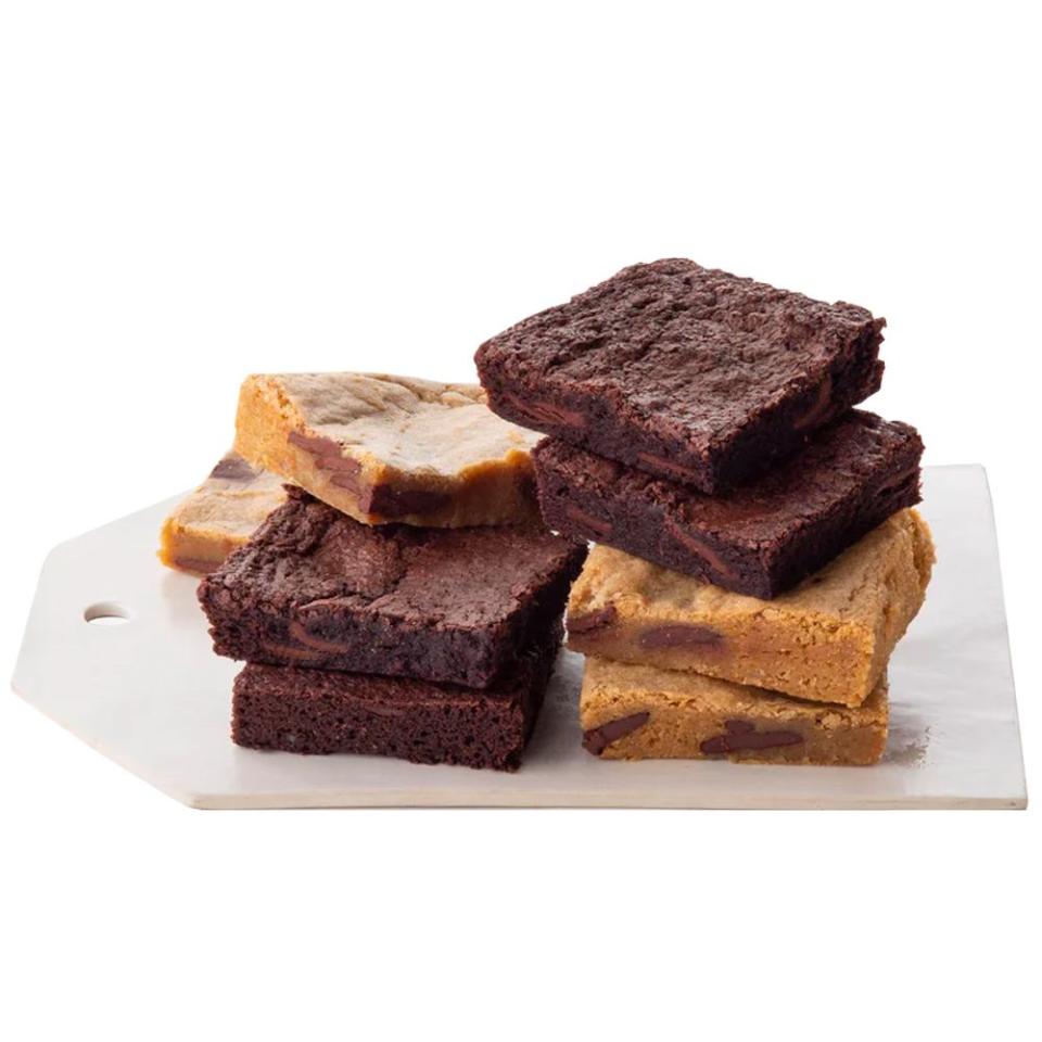 <p><a href="https://go.redirectingat.com?id=74968X1596630&url=https%3A%2F%2Fwww.magnoliabakery.com%2Fproducts%2Fbrownie-blondie-combo%3Fvariant%3D40928083181756%26child_variant%3D40928083935420&sref=https%3A%2F%2Fwww.bestproducts.com%2Flifestyle%2Fg45428918%2Fchocolate-gifts%2F" rel="nofollow noopener" target="_blank" data-ylk="slk:Shop Now;elm:context_link;itc:0;sec:content-canvas" class="link ">Shop Now</a></p><p>Brownie & Blondie Combo</p><p>magnoliabakery.com</p><p>$31.00</p>