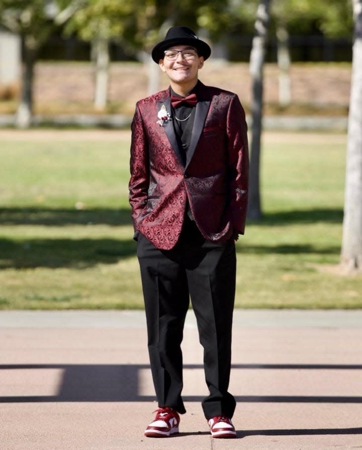 Adan Munoz poses for this photo in his prom outfit last year. Munoz passed away on April 15, 2023 after battling acute myeloid leukemia, a cancer of the bone marrow and blood.