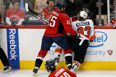 Apr 22, 2016; Washington, DC, USA; Washington Capitals left wing Jason Chimera (25) boards Philadelphia Flyers left wing Jakub Voracek (93) in the third period in game five of the first round of the 2016 Stanley Cup Playoffs at Verizon Center. Mandatory Credit: Geoff Burke-USA TODAY Sports