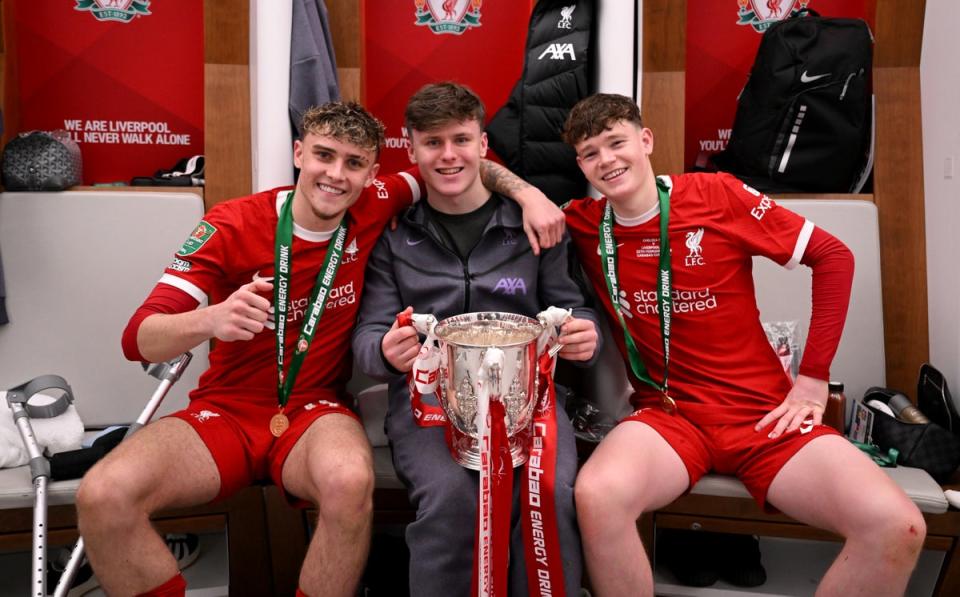 Bobby Clark (left), Ben Doak (injured, centre) and James McConnell (right) (Liverpool FC via Getty Images)