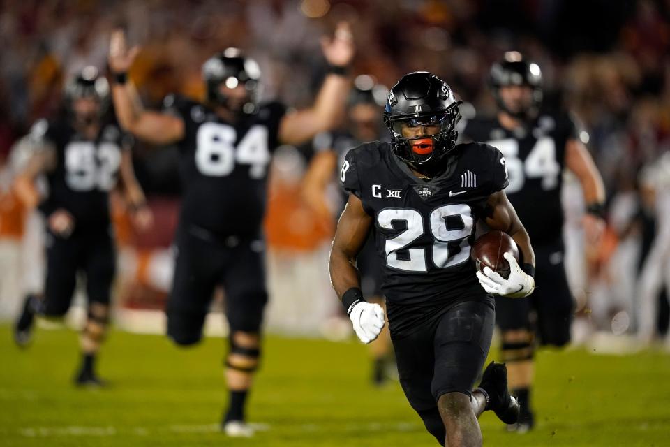 Iowa State running back Breece Hall (28) scores on a 47-yard touchdown run on Friday. Hall had 242 rushing yards and three touchdowns against TCU.