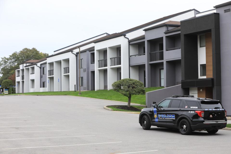 Town of Poughkeepsie police vehicles were stationed outside a Courtyard by Marriott Monday where on Sunday a shooting resulted in one guest killed.