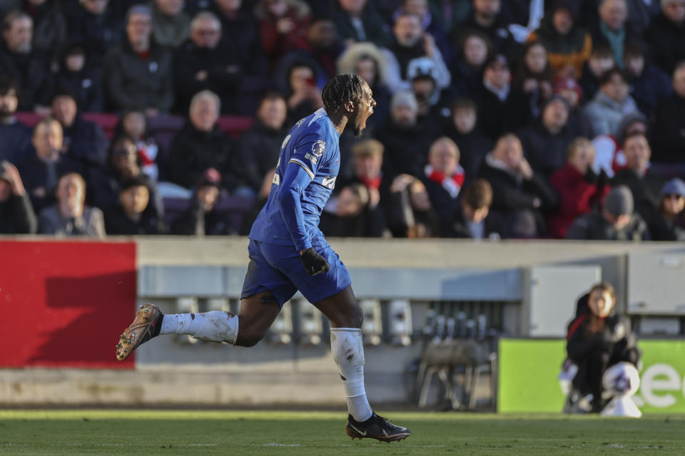 Chelsea's Axel Disai celebrates after scoring his side's second goal during an English Premier League soccer match between Brentford and Chelsea at the Gtech Community Stadium in London , Saturday, March 2, 2024. (AP Photo/Ian Walton)