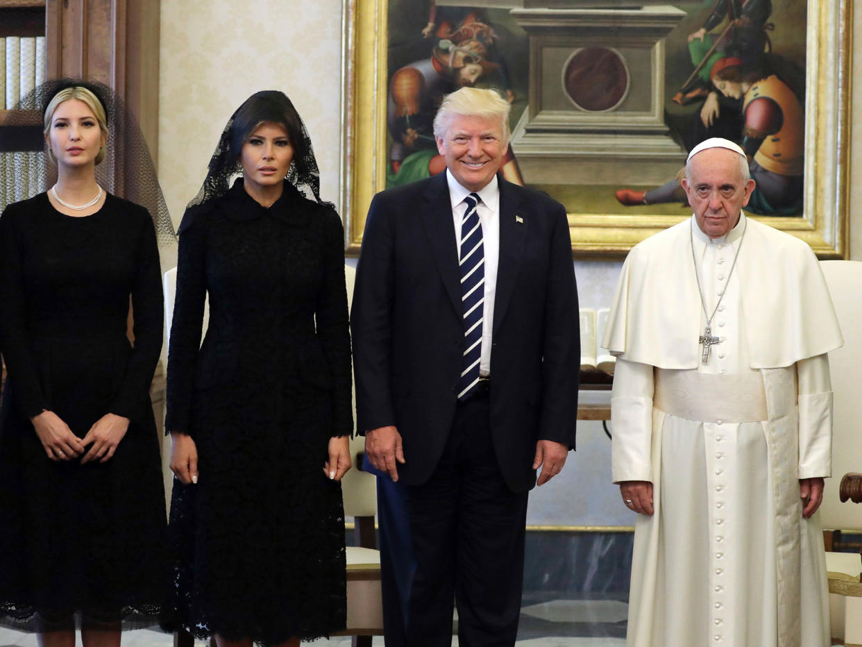 Pope Francis poses with US President Donald Trump, First Lady Melania Trump and the daughter of Ivanka Trump at the end of a private audience at the Vatican: AFP/Getty