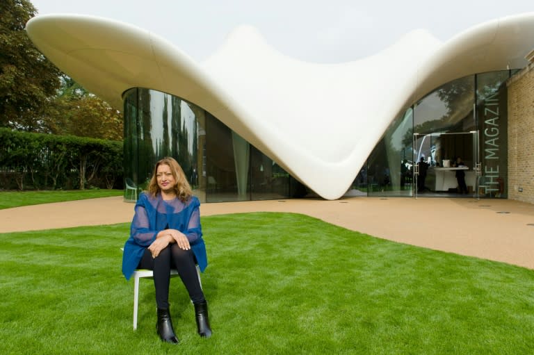 Iraqi-British architect Zaha Hadid posing for pictures outside her recently completed design for an extension of the Serpentine Sackler Gallery in London on September 25, 2013