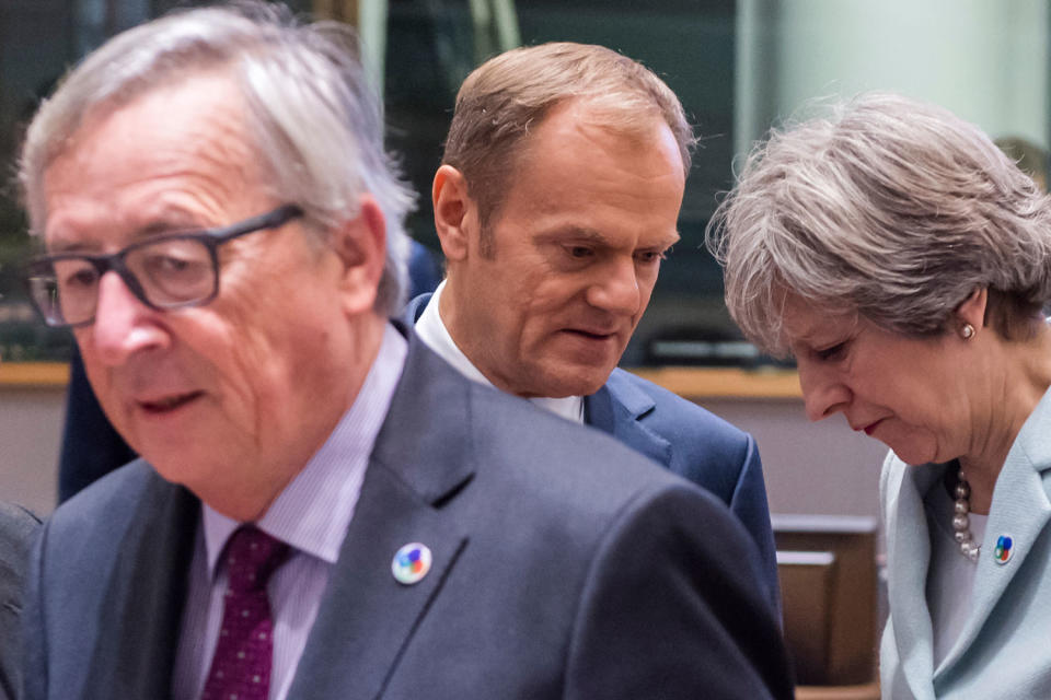 New deal: May, Tusk and Juncker in the foreground: AP